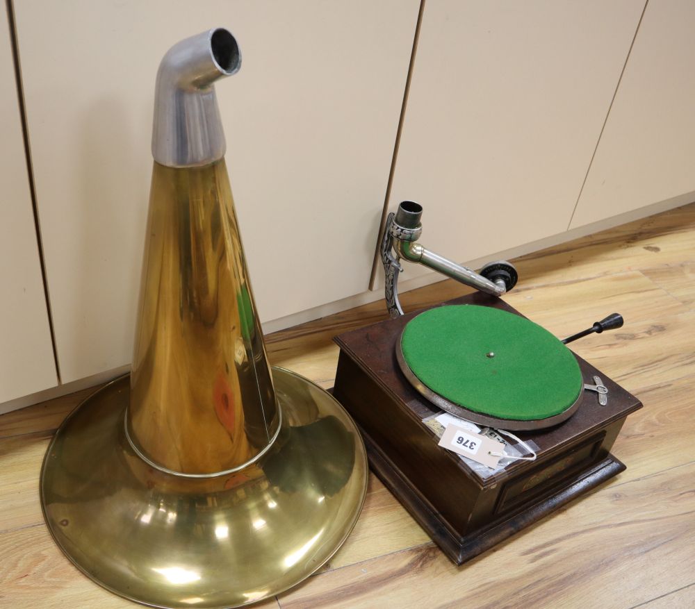 A table gramophone, The Shamrock, with horn, needles and two 78rpm records